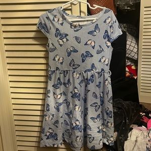 Blue and white striped dress with butterflies in a size 5/6.